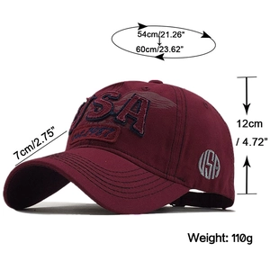 Detailed side view of dark burgundy USA cotton baseball cap with eagle embroidery