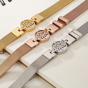 Three minimalist stainless steel mesh bracelets with Tree of Life charms in gold, silver, rose gold