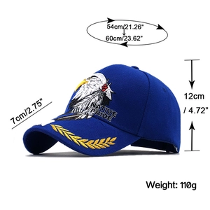 Detail of royal blue cap with USA eagle embroidery and golden leaf on the brim