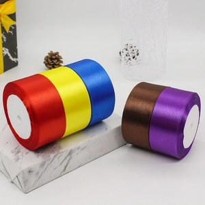 Rolls of 4cm colorful satin ribbon for flower bouquets and wedding gift packaging