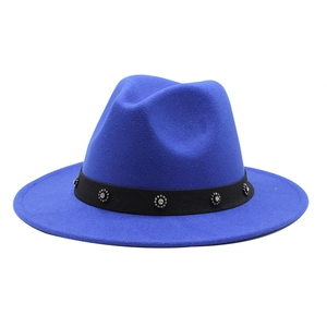 Detail of royal blue wool fedora hat with black band and sparkling crystal flower studs