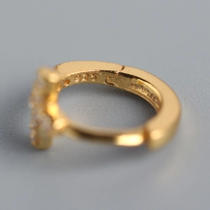 Polished gold S925 sterling silver huggie hoop earring with 925 authenticity hallmark