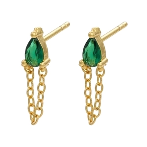 Close-up of gold stud earrings featuring drop-shaped green stones and delicate metal chains