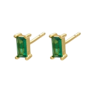 Macro detail of rectangle green gemstone earrings in a gold setting with micro pave studs