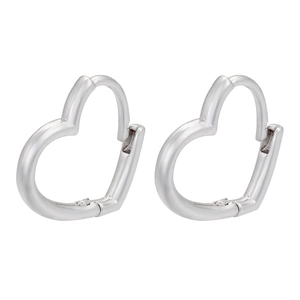 Close-up of heart-shaped silver earrings with polished finish on white background
