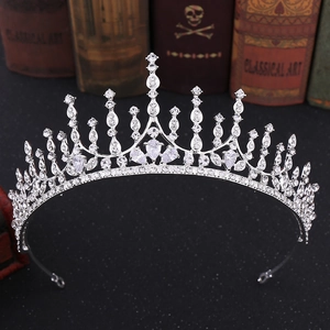 Detailed view of silver bridal tiara featuring teardrop zircon and classic crown design