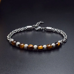 Close-up of 6mm tiger eye stone beads and stainless steel chain links with lobster clasp