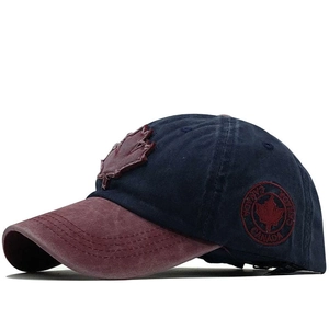 Vintage navy and burgundy washed cotton baseball cap with embroidered Canada maple leaf