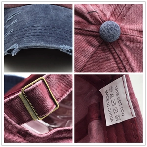 Detail view of washed cotton baseball cap showing distressed brim and vintage metal buckle