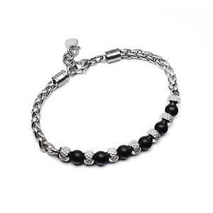 Detail of adjustable 6mm black bead and twisted silver steel chain bracelet with lobster clasp