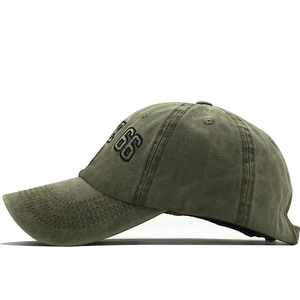 Detail of army green washed cotton baseball cap with embroidered number 66 on the side