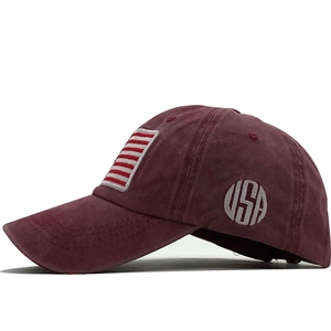 Side view of washed burgundy cotton baseball cap with USA embroidery and flag patch