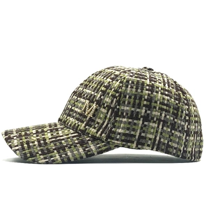 Women's plaid tweed baseball cap in olive and brown with a rhinestone M metal logo