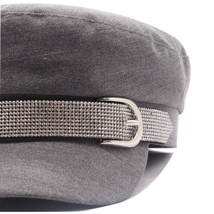 Grey newsboy hat with sparkling rhinestone band and silver metal buckle detail