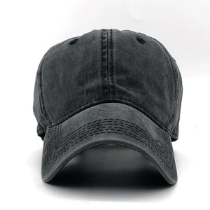 Classic washed black cotton baseball cap with vintage distressed texture and six-panel design