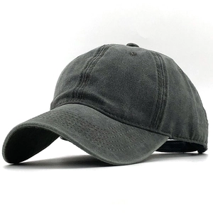 Detail view of charcoal grey washed cotton baseball cap with vintage distressed texture