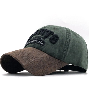 Washed cotton baseball cap in dark green and brown with ANTS 3D embroidery detail