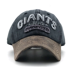 Close-up of vintage washed cotton baseball cap featuring detailed GIANTS 3D embroidery
