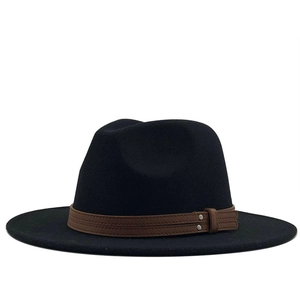 Classic black wool fedora hat with brown leather band and wide brim for autumn fashion