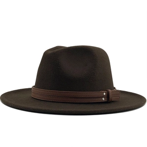 Detail of dark brown wool fedora hat featuring double leather bands and metal rivets