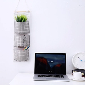 Grey plaid cotton linen hanging organizer with 3 pockets and wooden rod for wall storage