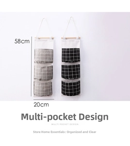 Detail of 3-pocket cotton linen hanging organizer with 58x20cm dimensions and wooden bar