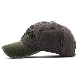 Detail view of cotton outdoor hat featuring vintage Mountain Camping 3D embroidery