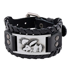 Macro view of wide black leather punk bracelet featuring a silver moose embossed metal plate