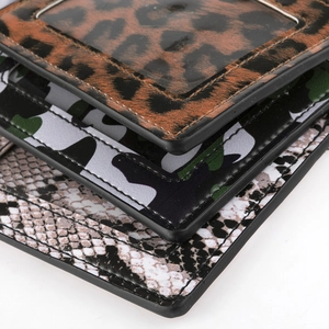 PU leather card holder keychain with leopard, camo, and snake prints shown in detail