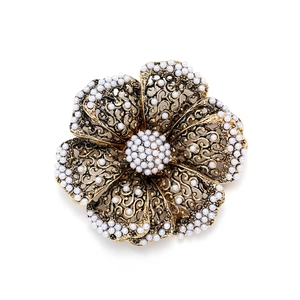 Vintage gold hollow flower brooch with white faux pearls and baroque floral design