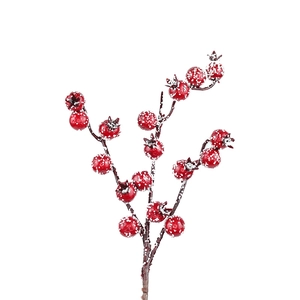 Artificial red Christmas berry branch with faux snow for festive tree decoration
