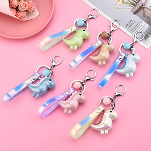 Set of 6 colorful cartoon dinosaur keychains with gradient straps and resin charms