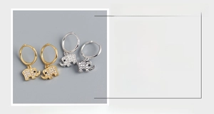 Vue détaillée des créoles éléphant en argent sterling S925 avec incrustation de zircon