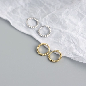Close-up of S925 sterling silver beaded earrings with inlaid sparkling crystals