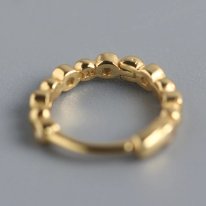 Minimalist gold S925 sterling silver beaded hoop earring featuring a 925 hallmark