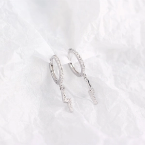 Detail of S925 sterling silver lightning bolt earrings featuring cubic zirconia pavé