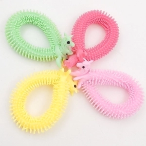 Detailed top view of four colorful sensory unicorn bracelets in mint, pink, and yellow