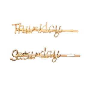 Golden alloy word hairpins featuring Saturday and Thursday lettering in cursive style