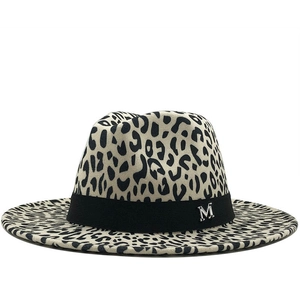 Classic leopard print wool fedora hat with a black ribbon band and metal M emblem