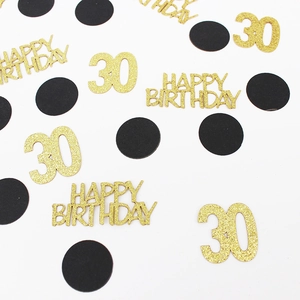 Detailed view of gold glitter Happy Birthday 30 and black round party table confetti