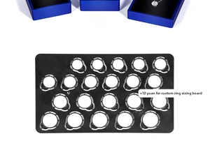 Black ring size measuring tool for sizing a Moissanite silver ring in jewelry box