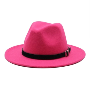 Pink felt fedora hat featuring a black faux leather band with a silver metal buckle detail