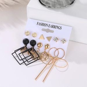 Detailed close-up of a 6-piece earring set featuring geometric designs on a display card