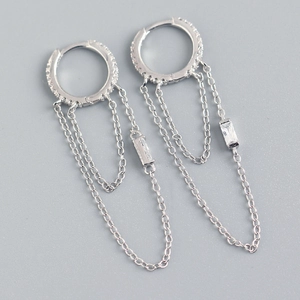 Detail of S925 sterling silver hoop earrings with chain tassels and rectangular zircon