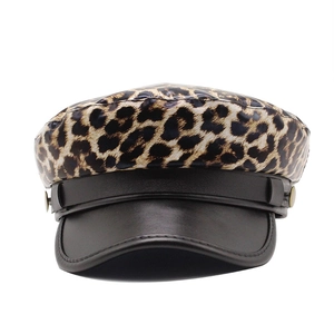 Leopard print beret with black leather brim and metal buttons for autumn outdoor style