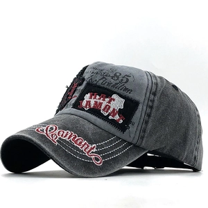 Washed grey cotton baseball cap with vintage embroidery and street style design