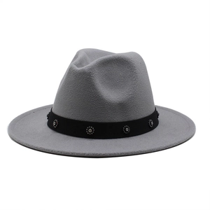 Detail of grey wool fedora hat featuring a black band with sparkling rhinestone clusters