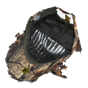 Detail view of the 3D camouflage hat interior with breathable mesh lining and brand label
