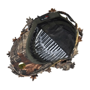 Detail view of 3D leaf camo hunting hat featuring breathable black mesh lining and label