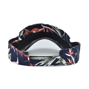 Detail of adjustable velcro strap on tropical floral visor hat for beach sun protection